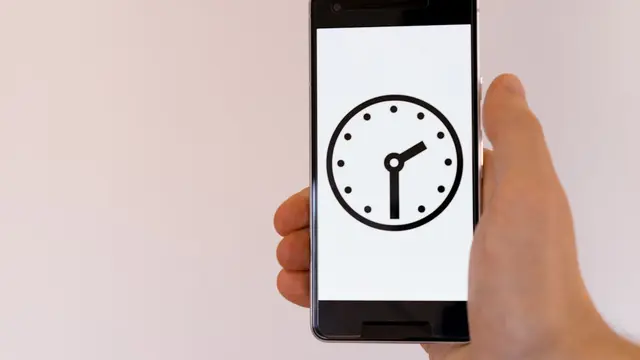 person holding black android smartphone