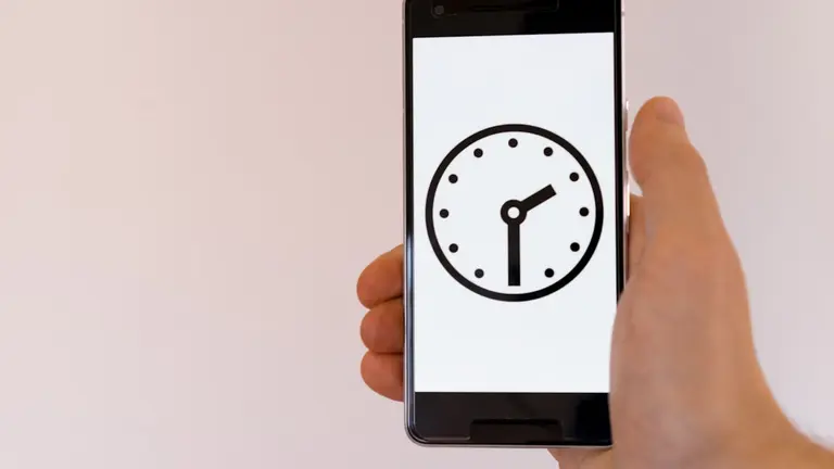 person holding black android smartphone